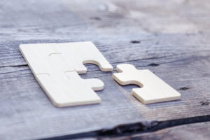 eficiencia y eficacia representada en un puzzle