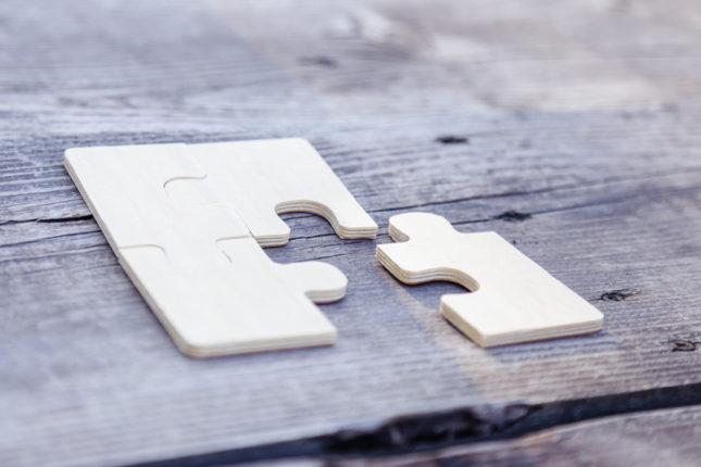 eficiencia y eficacia representada en un puzzle